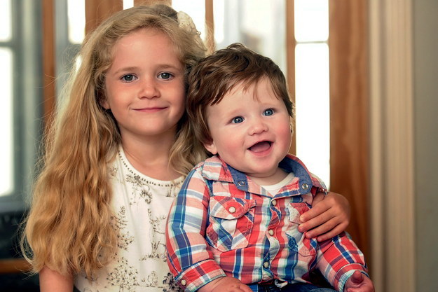 Fergus's hair runs in the family. His mum, 5-year-old sister Ella (below), and grandad were all born with a full head of hair.